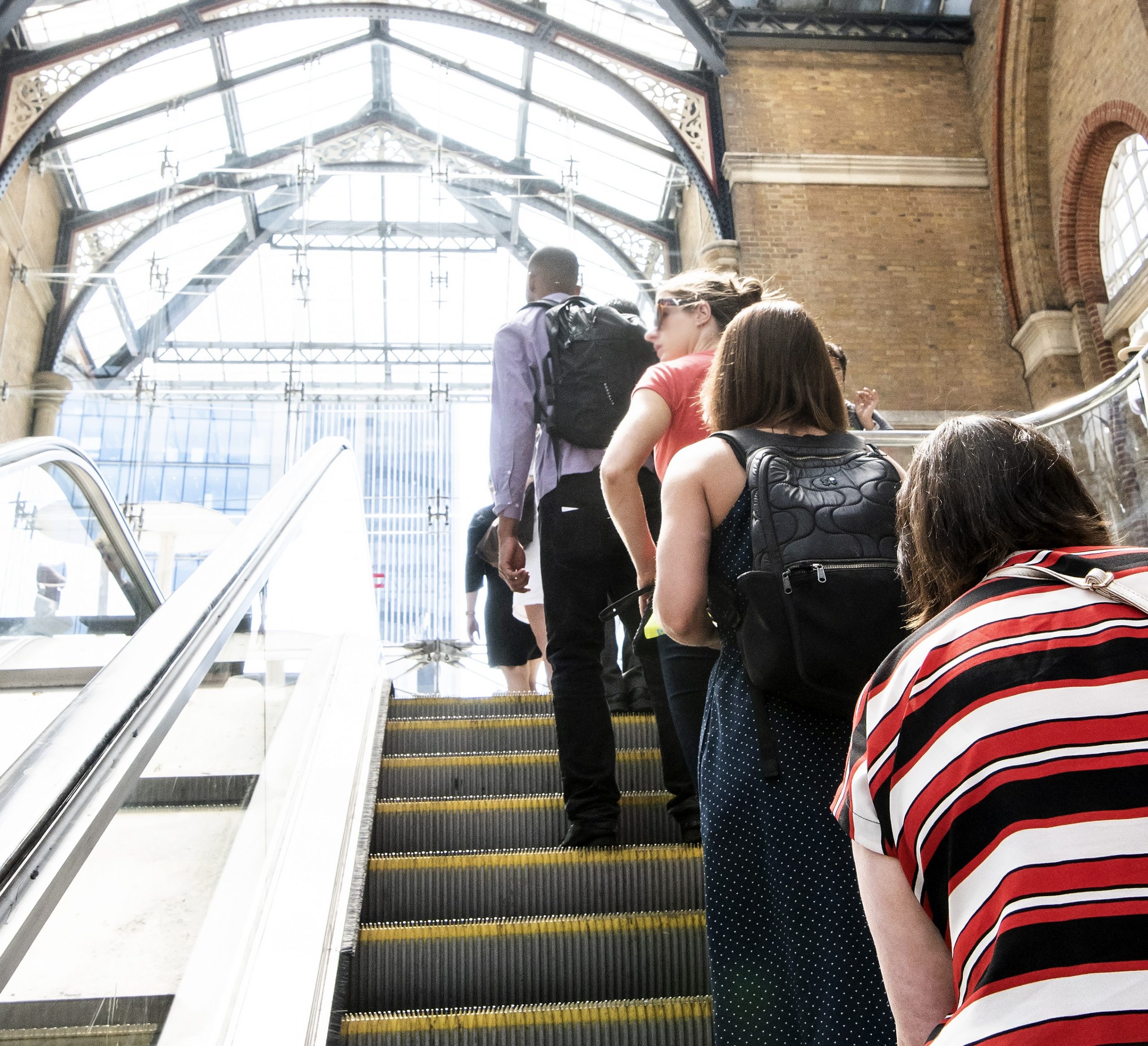 people on escalator